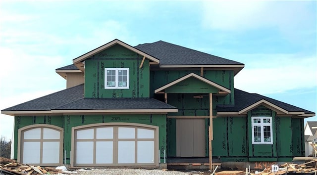 view of front of property with a garage