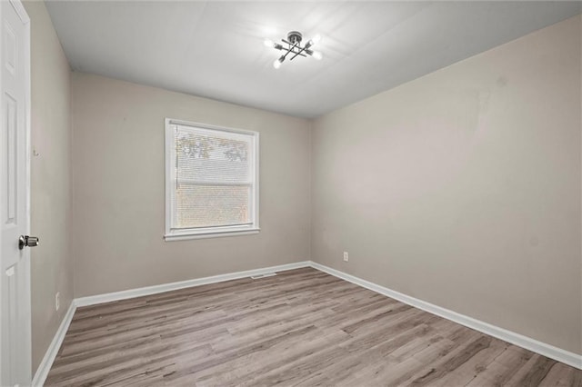 empty room featuring light hardwood / wood-style floors