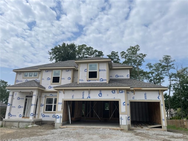 property in mid-construction featuring a garage