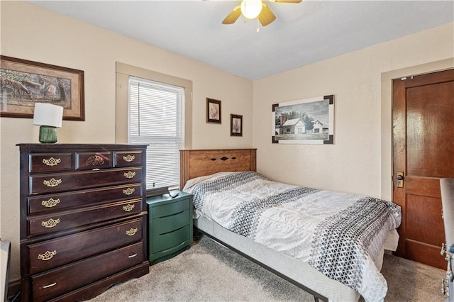 bedroom featuring carpet floors and ceiling fan