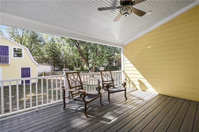 wooden deck with ceiling fan