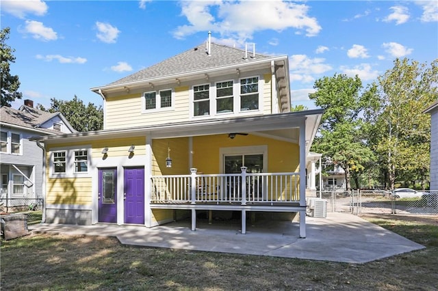 rear view of house featuring central air condition unit, a patio area, and ceiling fan