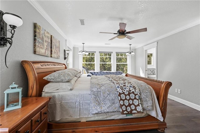 bedroom with dark wood-type flooring, ceiling fan with notable chandelier, and crown molding