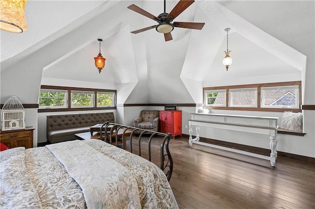 bedroom with dark wood-type flooring and vaulted ceiling