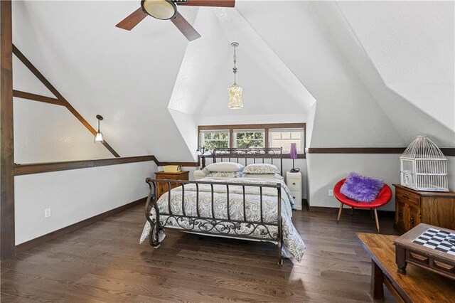 bedroom with lofted ceiling, dark hardwood / wood-style flooring, and ceiling fan