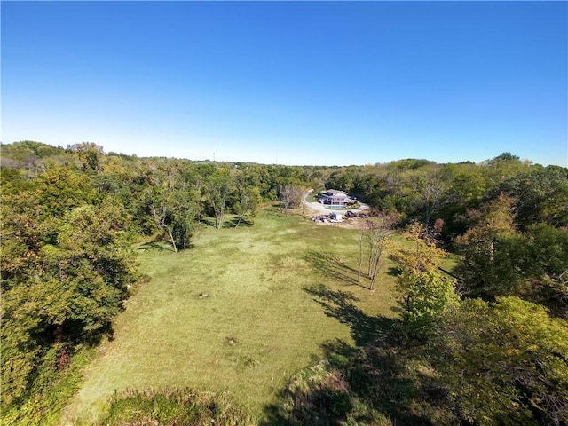 birds eye view of property with a rural view