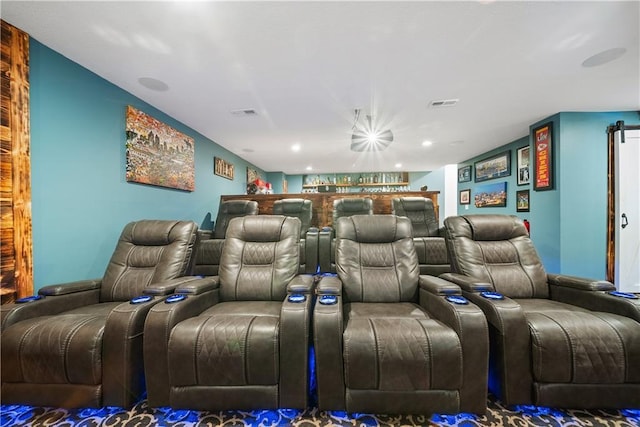 home theater room featuring visible vents