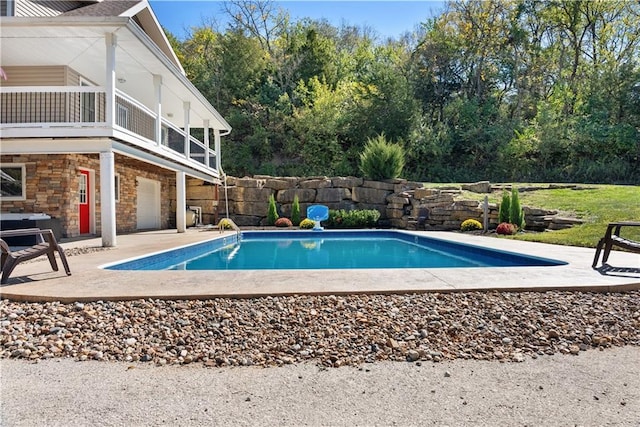 view of pool with a patio area and a fenced in pool