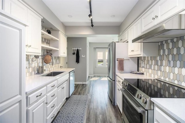 kitchen with white cabinetry, sink, stainless steel appliances, tasteful backsplash, and dark hardwood / wood-style flooring