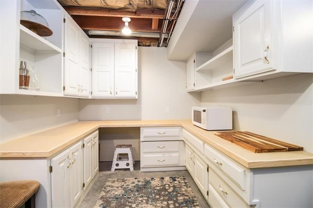 kitchen with white cabinetry