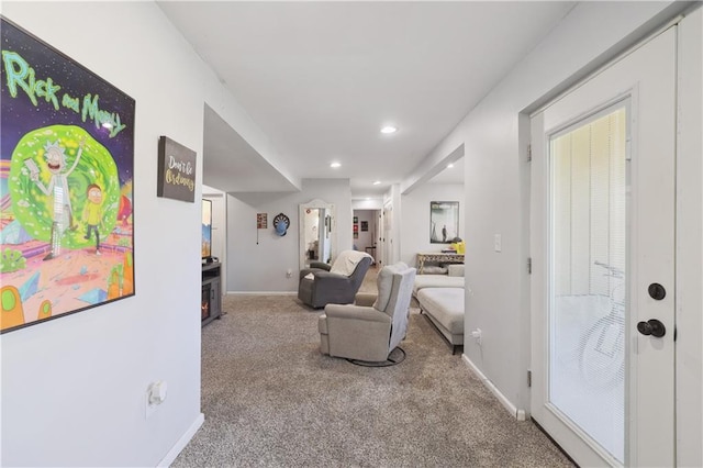 living area with carpet flooring