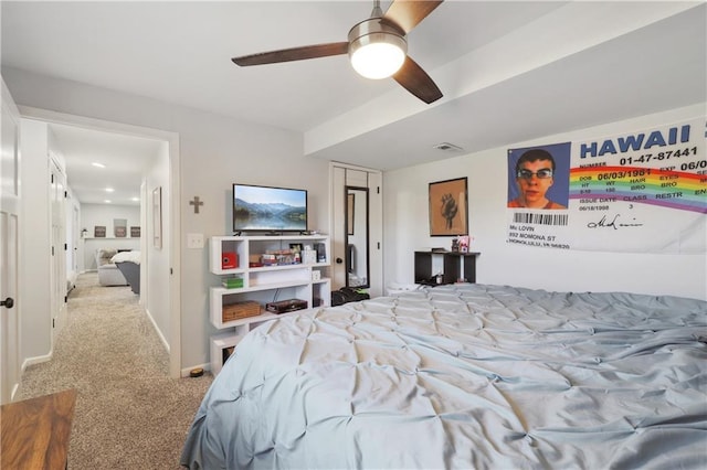 carpeted bedroom featuring ceiling fan