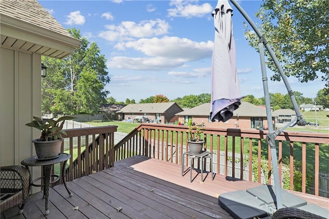 deck featuring a lawn