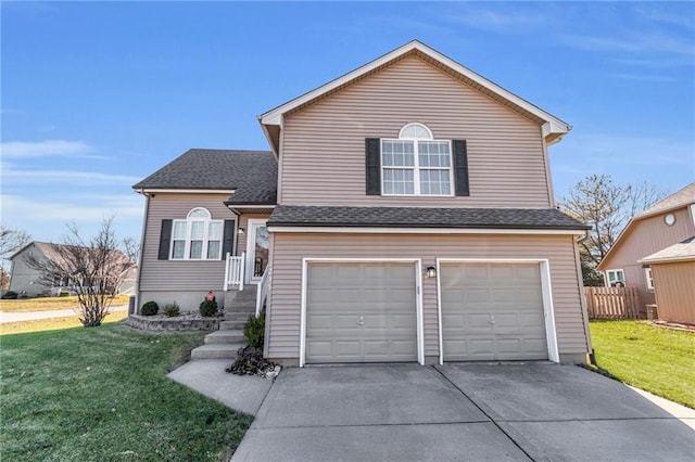 front of property featuring a garage and a front lawn