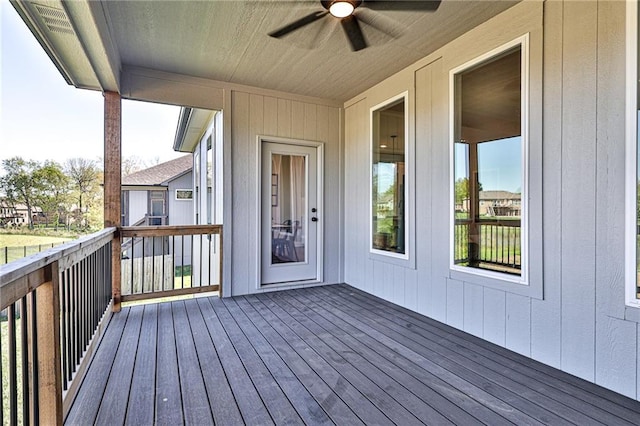 wooden terrace with ceiling fan