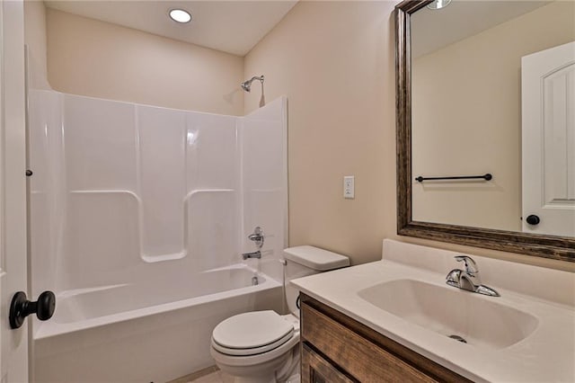 full bath with toilet, vanity, and bathtub / shower combination