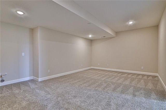 carpeted empty room with recessed lighting, baseboards, and visible vents