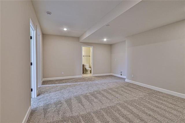 unfurnished room featuring baseboards, carpet floors, and recessed lighting