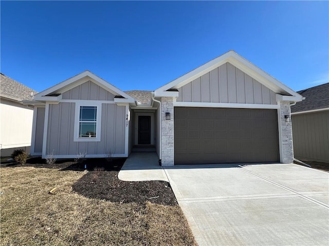 ranch-style home featuring board and batten siding, driveway, a shingled roof, and a garage