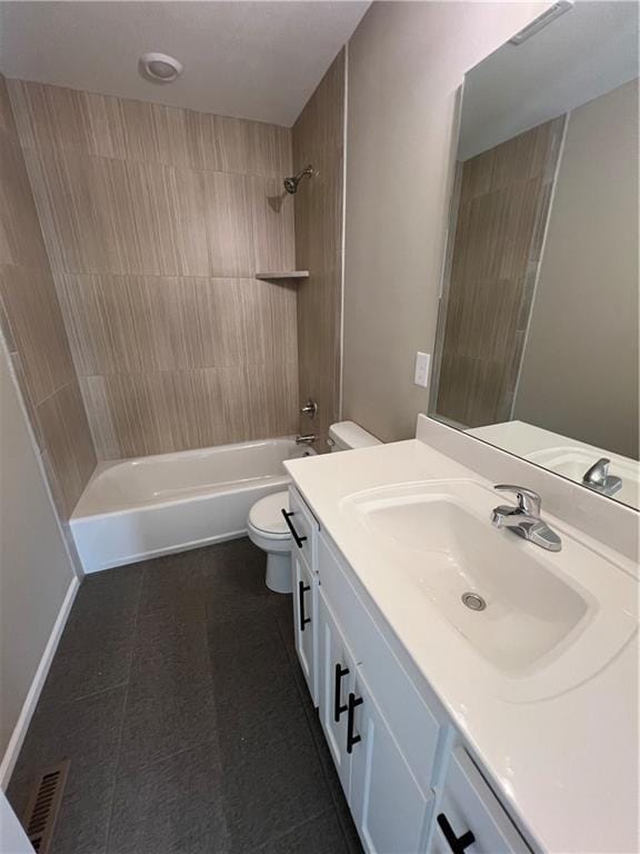 full bathroom with vanity, toilet, and tiled shower / bath