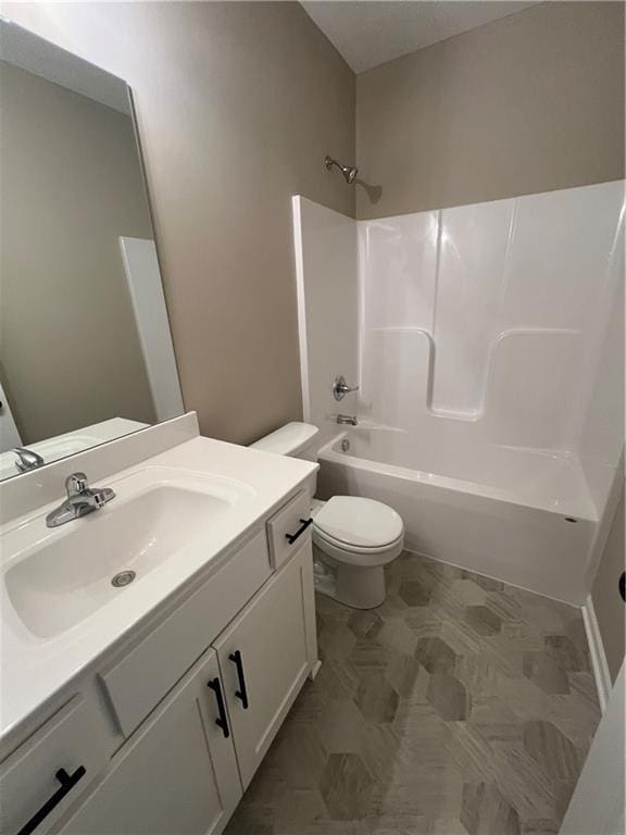 full bathroom with shower / bathing tub combination, vanity, and toilet