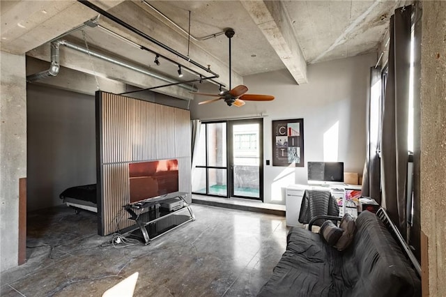 living room featuring ceiling fan