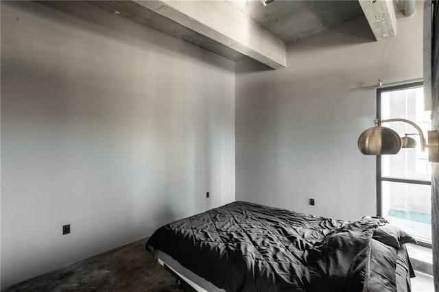 bedroom with concrete floors