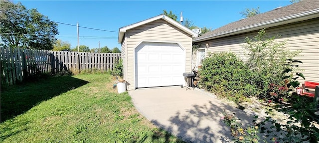 garage with a yard