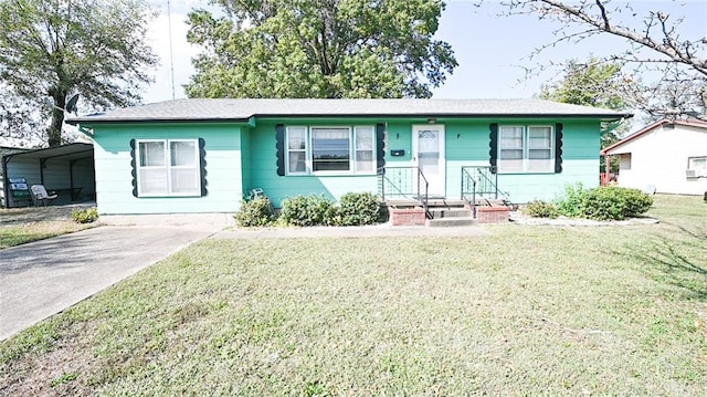 single story home featuring a front lawn and a carport