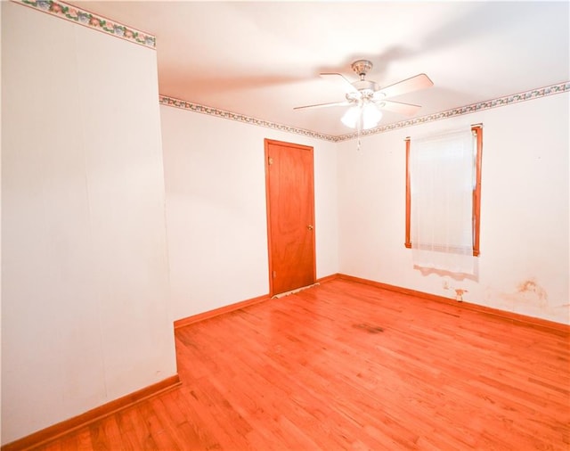 unfurnished room featuring wood-type flooring and ceiling fan