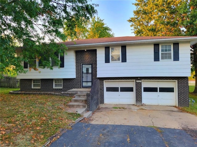 split foyer home featuring a garage