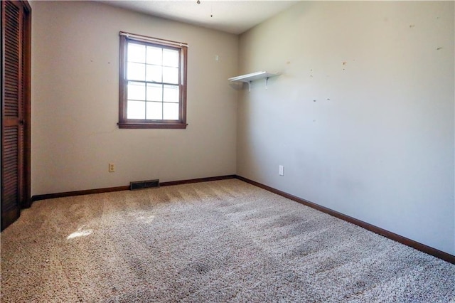 view of carpeted spare room