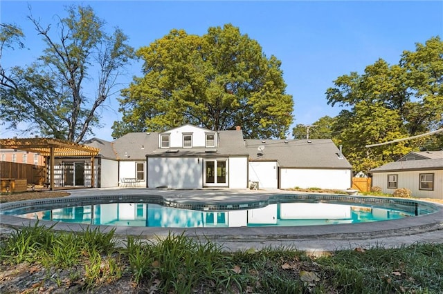 view of swimming pool featuring a pergola