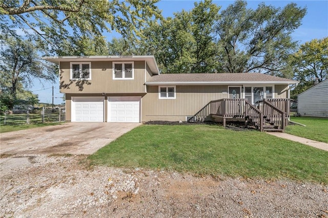 view of front of house with a garage and a front yard