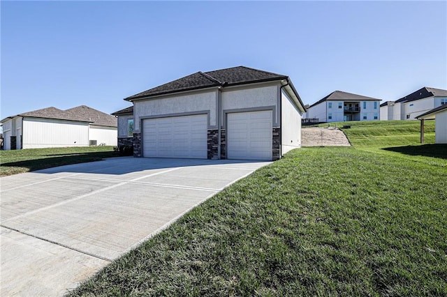 view of property exterior with a yard and a garage