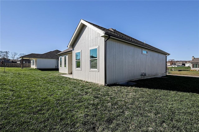 view of home's exterior featuring a lawn