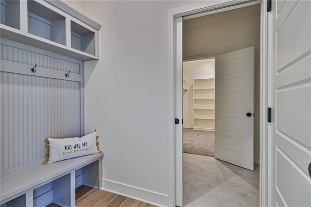 mudroom with light hardwood / wood-style flooring