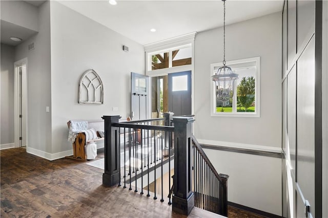 hall with dark wood-type flooring