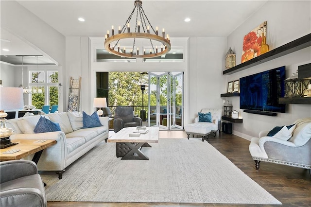 2804 NW Nutall Ct, Lees Summit, MO 64081 - living area featuring wood finished floors, a chandelier, and recessed lighting