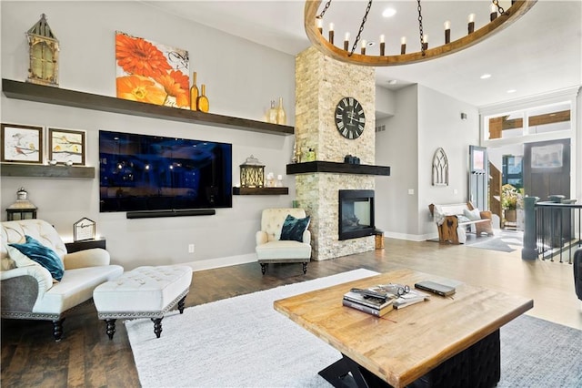 2804 NW Nutall Ct, Lees Summit, MO 64081 - living area with wood finished floors, a towering ceiling, recessed lighting, and a fireplace