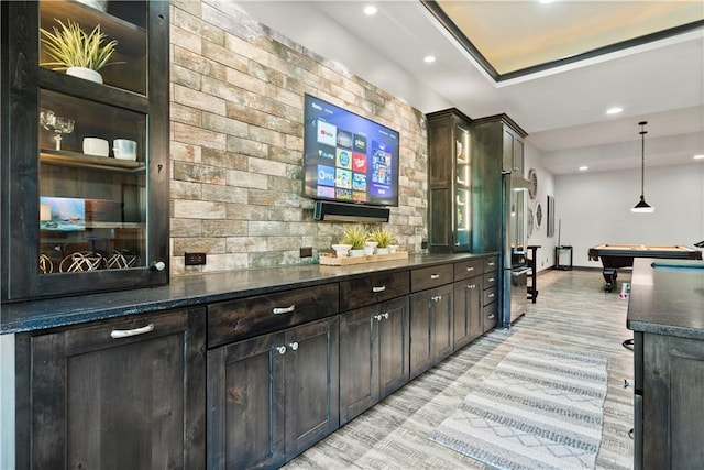 bar featuring tasteful backsplash, dark brown cabinetry, billiards, and decorative light fixtures