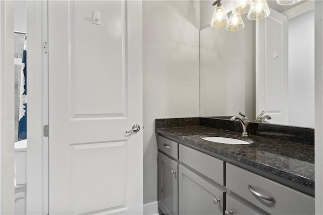 2804 NW Nutall Ct, Lees Summit, MO 64081 - full bath featuring vanity and a chandelier