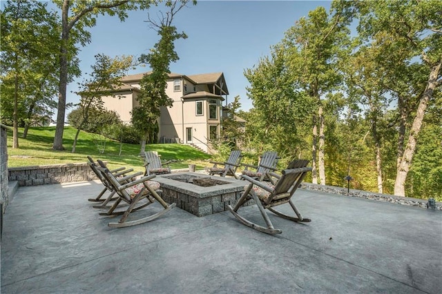 2804 NW Nutall Ct, Lees Summit, MO 64081 - view of patio with an outdoor fire pit