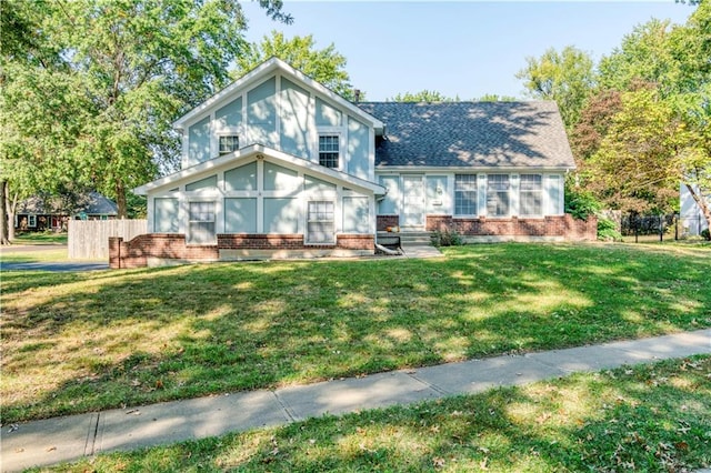 view of front of house with a front lawn