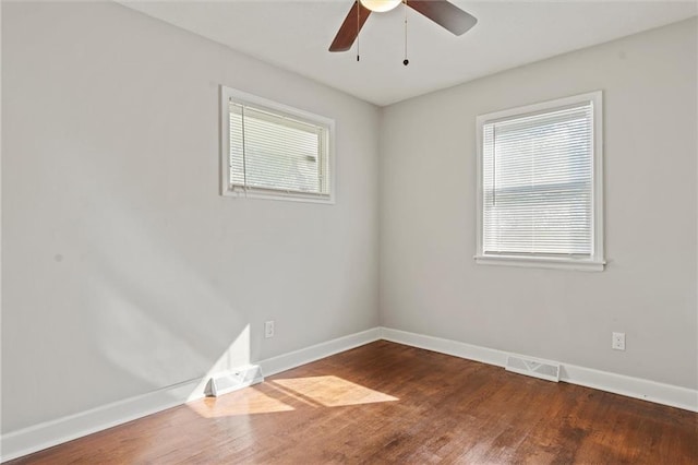 unfurnished room with wood-type flooring and ceiling fan