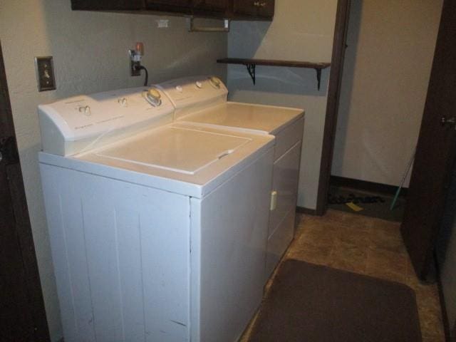 washroom featuring washer and dryer