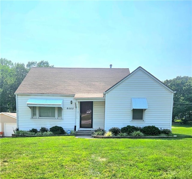 ranch-style home with a front yard