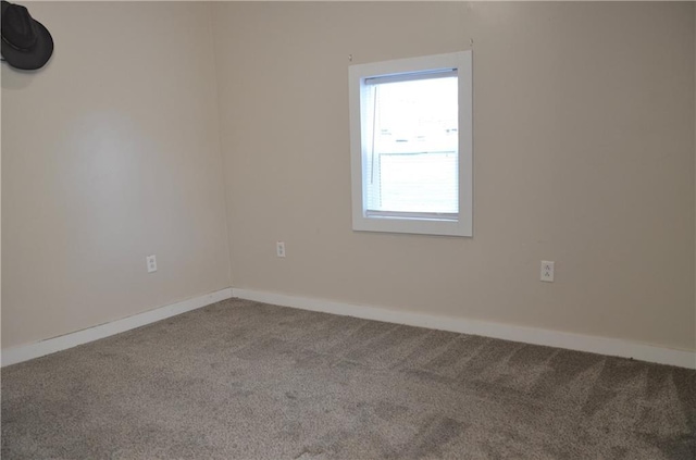 view of carpeted spare room