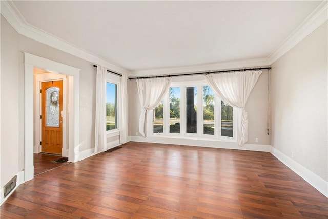 unfurnished room with crown molding and dark hardwood / wood-style flooring