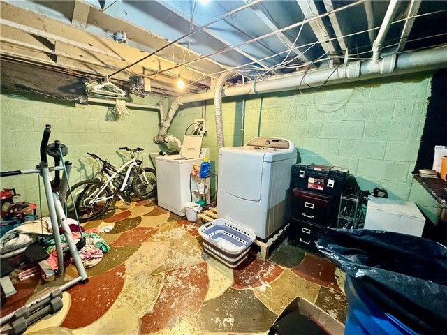 basement with washing machine and clothes dryer